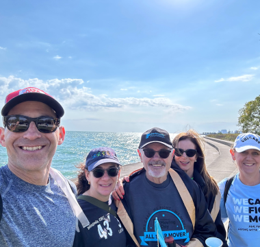 Tom, wife, and friends taking a selfie on an outdoor walk